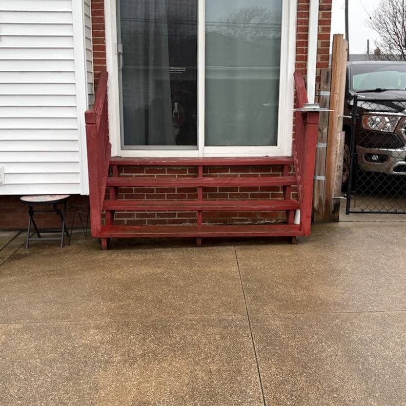 residential deck with built-in stairs