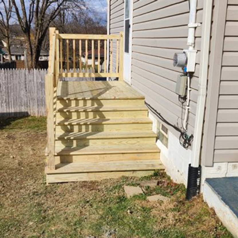 porch addition with vinyl railing