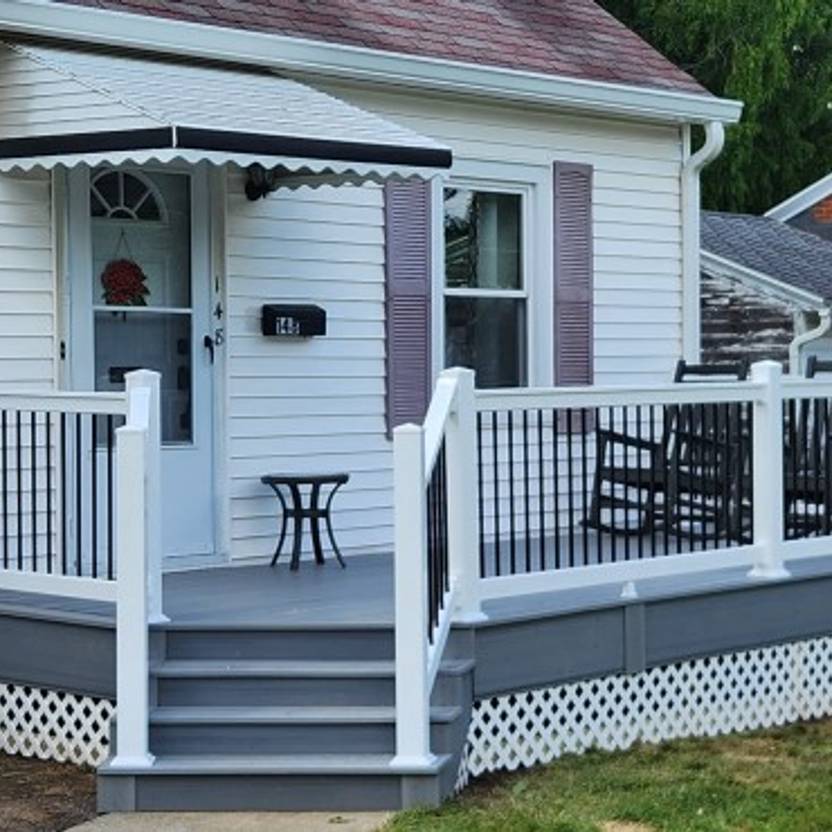 covered deck with ceiling fan installed